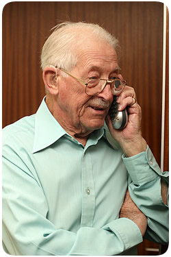Man on the telephone receiving benefits advice